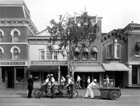 The Dapper Dans astride their bicycle in 1965