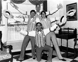 The quartet poses in 1980